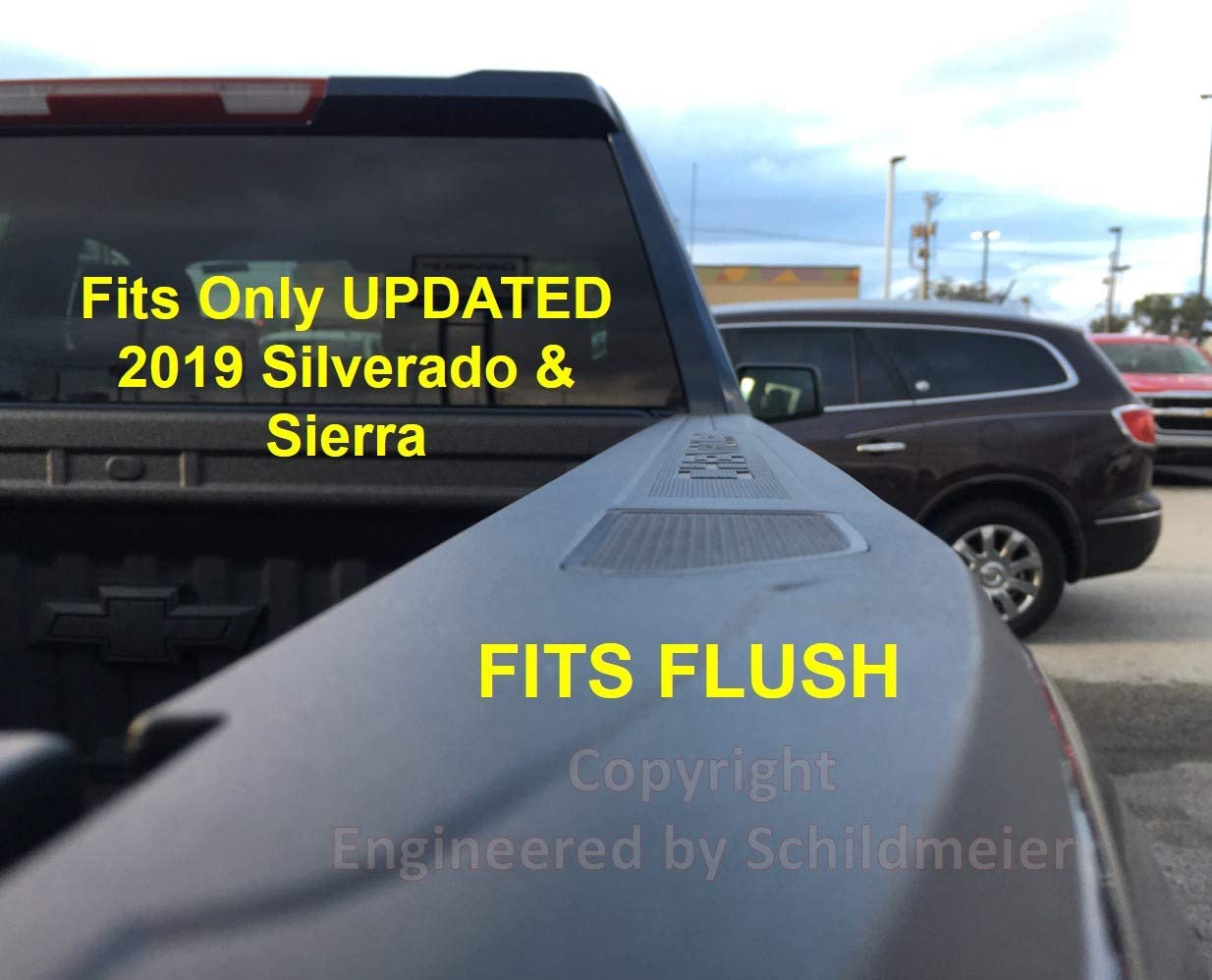 Truck bed rail of 2019 Chevy Silverado pickup showing flush fit Railcaps stake pocket cover with text overlay indicating these Railcaps stake pocket covers fit flush into the truck bed rails of 2019 and 2020 Chevy Silverado and GMC Sierra pickup trucks. Image is copyright Engineered by Schildmeier.